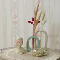 گلدان و مجسمه های سنگ مصنوعی ودستمال دکوراتیو