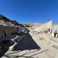 زمین-با-بنای-احداثی