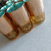 یکدست لیوان کُره ای تراش خورده طلاکوب