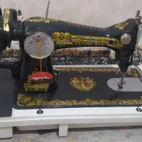 چرخ خیاطی مرد پرنده
