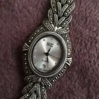 ساعت نقره سیاه قلم
