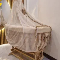 تخت نوزاد گهواره دار