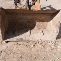 یک دستگاه بیل 285 و یک دستگاه مکش تریلی تک جک