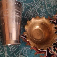یک عدد قندان برنجی ویک لیوان اونم برنجی