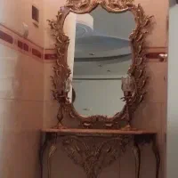 اینه و شمعدان برنجی