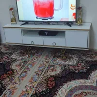 دوتا گنجه با یک عدد میز تی وی