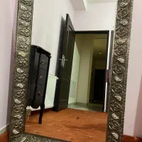 آینه با قاب برنجی