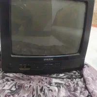 تلویزیون و چوب پرده
