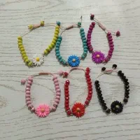 دستبند دخترانه گل بابونه رنگی