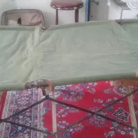 تخت تاشو برزنتی صحرایی-کیسه خواب-میزتاشو