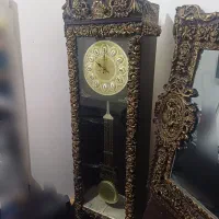 اینه کنسول و ساعت ایستاده
