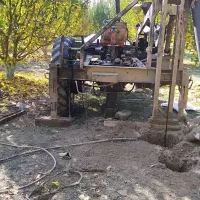 حفاری چاه آب باتراکتور