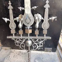 علامت سه تیغ نقره کوب
