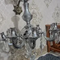 لوستر برنزی و شمعدان و ساعت برنجی