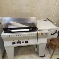دستگاه وکیوم و دستگاه پک کمد دو در و گاز