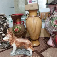 مجسمه و گلدان