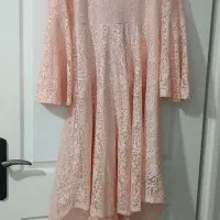 یکسری لباس مجلسی یکبار پوشیده شده