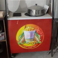 یه دستگاه ذرت مکزیکی و پیراشکی گرمکن