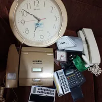 ساعت.ماشین حساب.تلفن نیازمند تعمیر و دست دوم