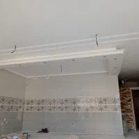 .کاشی‌کاری و سرامیک و تعمیرات آب و فاضلاب ساختمان
