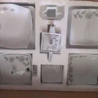 سرویس چینی۶نفره.و سیرویسی داخل ویترینی