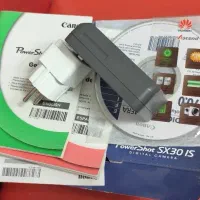 شارژر اصلی و کارتن دوربین canon