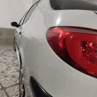 پژو ۲۰۶ اس دی v8بی رنگ دارای لامپ هت لایت اصل