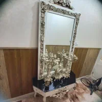 اینه وشمعدانی وساعت