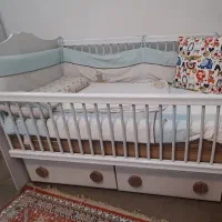 تخت گهواره ای نوزاد