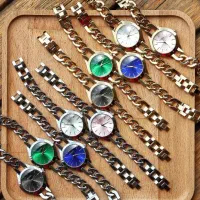 ساعـت گوچـی بند کارتیر زنانه صفحه سبز آبی ژاپن