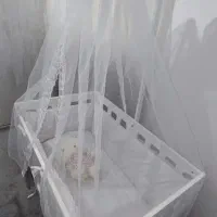 تخت و گهواره کنار مادر نوزاد