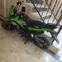 موتور مینی جترو ۱۱۰ سی سی شماره کپشن