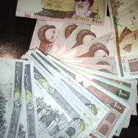 تعدادی پول و اسکناس قدیمی رند و شماره سریالی