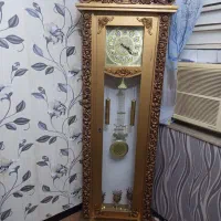 ساعت  و بوفه  و میز چرخ خیاطی