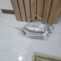 اتو مخزن دار بیم