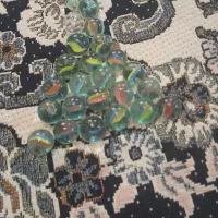 تیله نوع بزرگ و کوچک