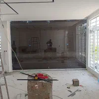 درب کرکره برقی وجک پارکینگی ودرب شیشه سکوریتاتومات