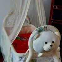 گهواره و آغوشی کودک نو