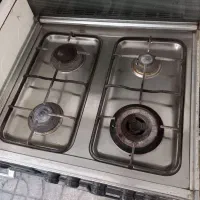 اجاق گاز ۴ شلعه با فر و جوجه گردان