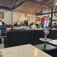 سری زن وسط کار قهوه خانه  سفره خانه قلیون