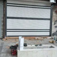 نصب و تعمیر کرکره برقی شیشه سکوریت جک بازویی