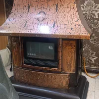 بخاری گازی طرح شومینه هخامنشی