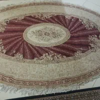 فرش بیضی کارکرده