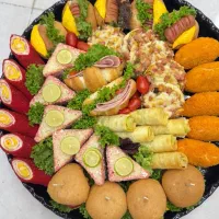 طراحی و اجرای فینگر فود و میز آرایی و گل آرایی