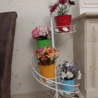 استند گل همراه با گل مصنوعی