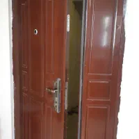 درب آپارتمانی به همراه حفاظ آهنی آکاردیونی