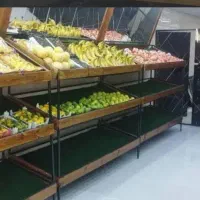 قفسه میوه فروشی همراه با اینه
