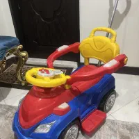 ماشین چهارچرخ دسته دار