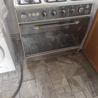 گاز طرح فر 5 شعله درب شیشه ای کاملا سالم