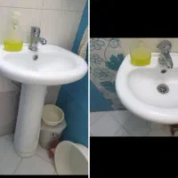 یک عدد روشویی کارکرده بدون شیر و سیفون
